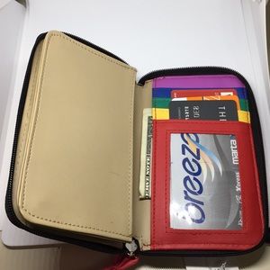 ACI Brands Pink and Black wrist wallet